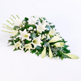 Flores Condolencias Cubre Urna de 15 Liliums Blancos